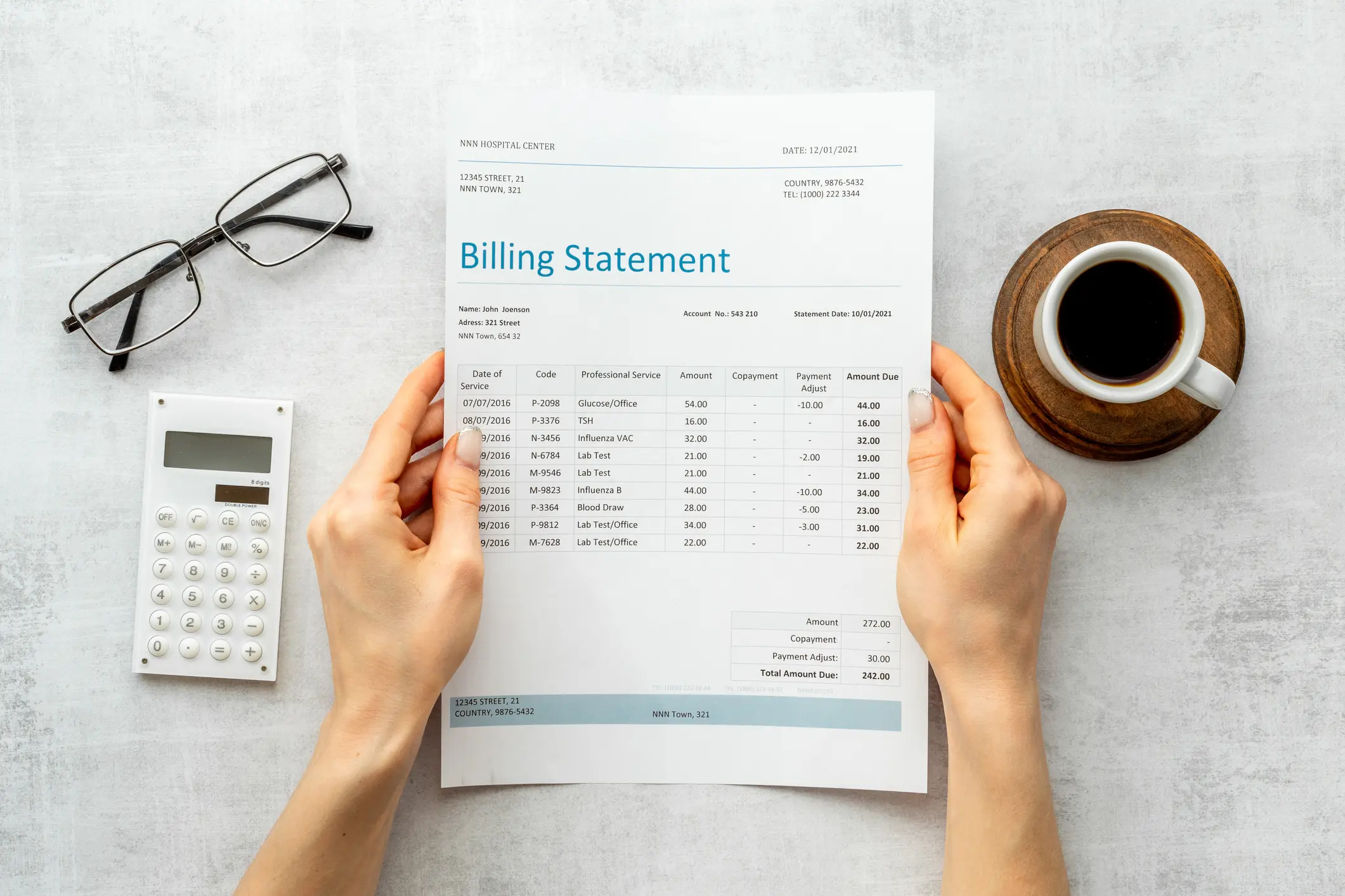 Hands holding medical billing statement. Payment for health care service.
